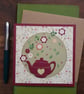 Handmade, blank card with Dark Red Teapot, flowers and leaves. keepsake