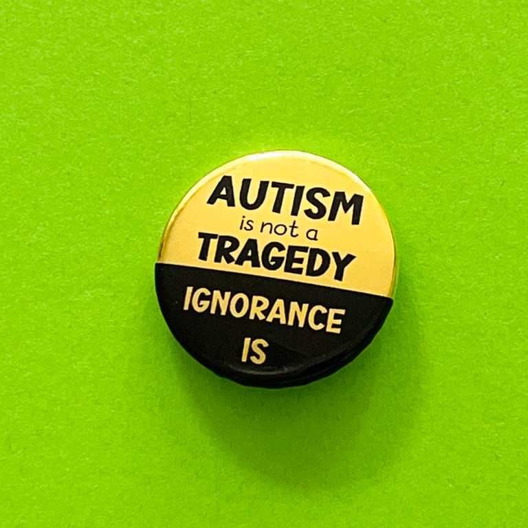Autism is not a tragedy badge, pocket pebble, magnet or keyring. 