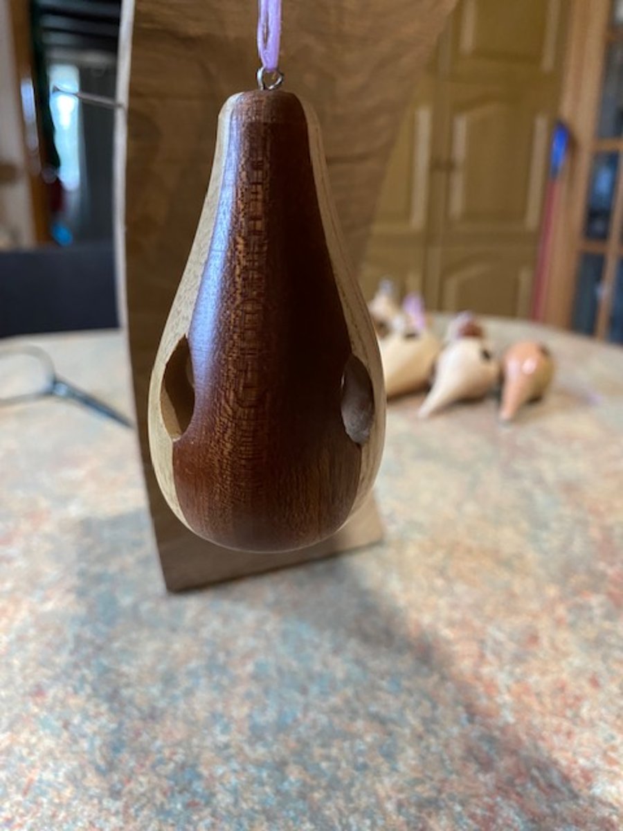 Long Oak and Sapele wood Christmas tree decoration.