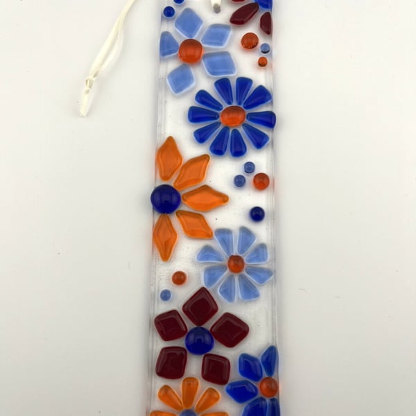 Fused glass suncatcher with Red, Orange and Blue flowers