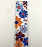 Fused glass suncatcher with Red, Orange and Blue flowers