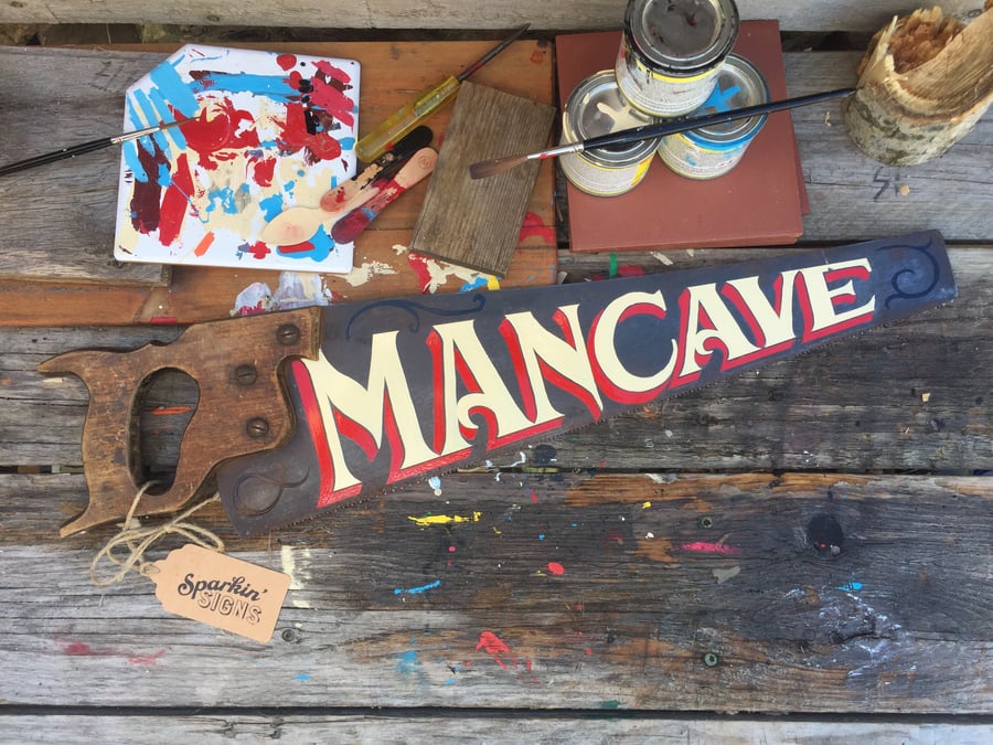 'MANCAVE' hand-painted vintage saw