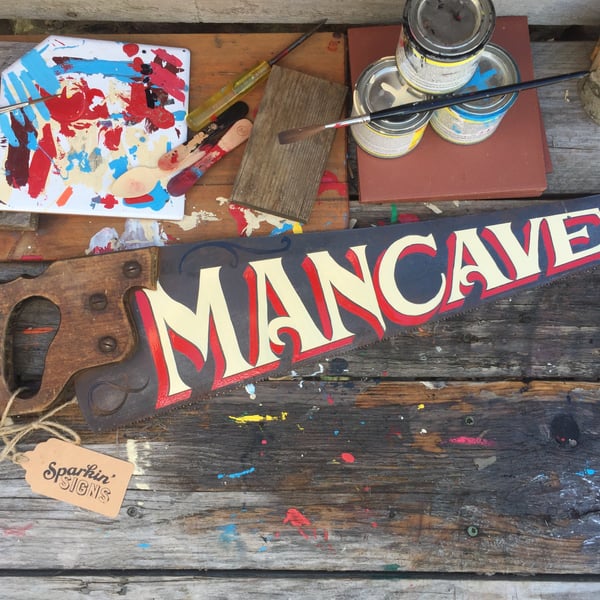 'MANCAVE' hand-painted vintage saw