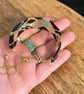 Geometric beadwork peyote bracelet in black and gold with slider chain  - Image 7