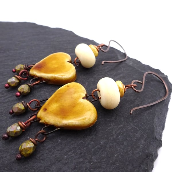 ceramic heart and ivory lampwork glass earrings