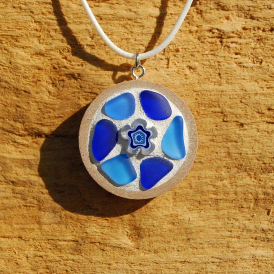 Beach glass mosaic pendant with blue flower
