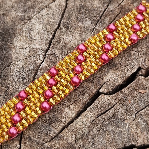 Glittering gold and scarlet red beaded bracelet