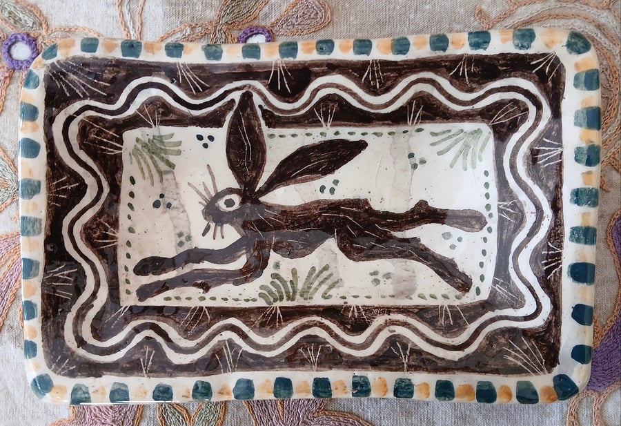 Square slip ware dish with hand painted hare