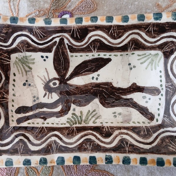 Square slip ware dish with hand painted hare