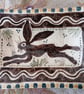 Square slip ware dish with hand painted hare
