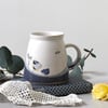 Blue and white ceramic tea coffee mug with bee and flower - handmade pottery