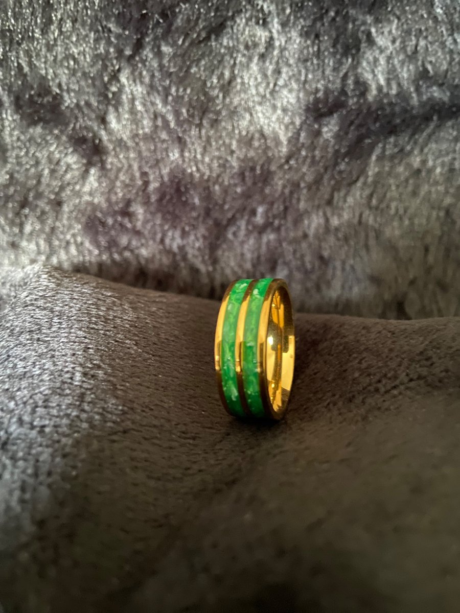 Resin ring with green and gold 