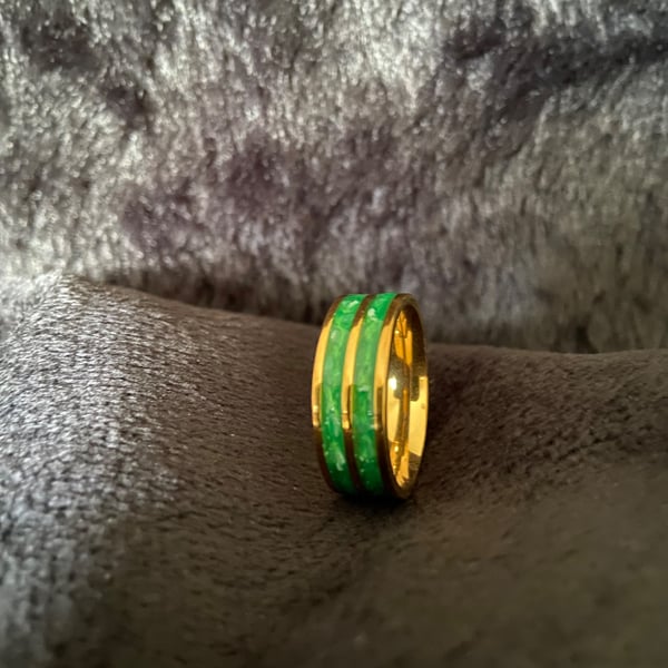 Resin ring with green and gold 