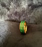 Resin ring with green and gold 