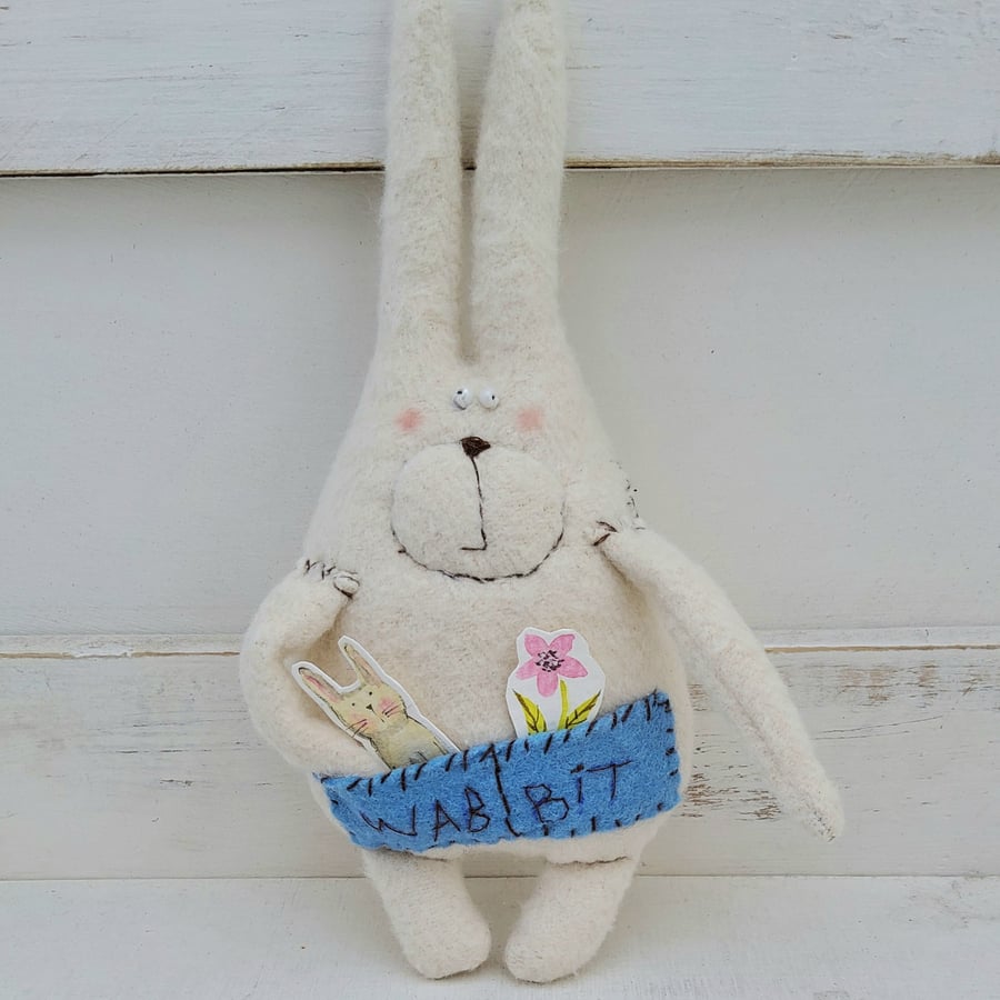 Folk art rabbit doll