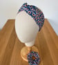 Cotton headband, twist knot style hairband in blue with a daisy floral print. - Image 5