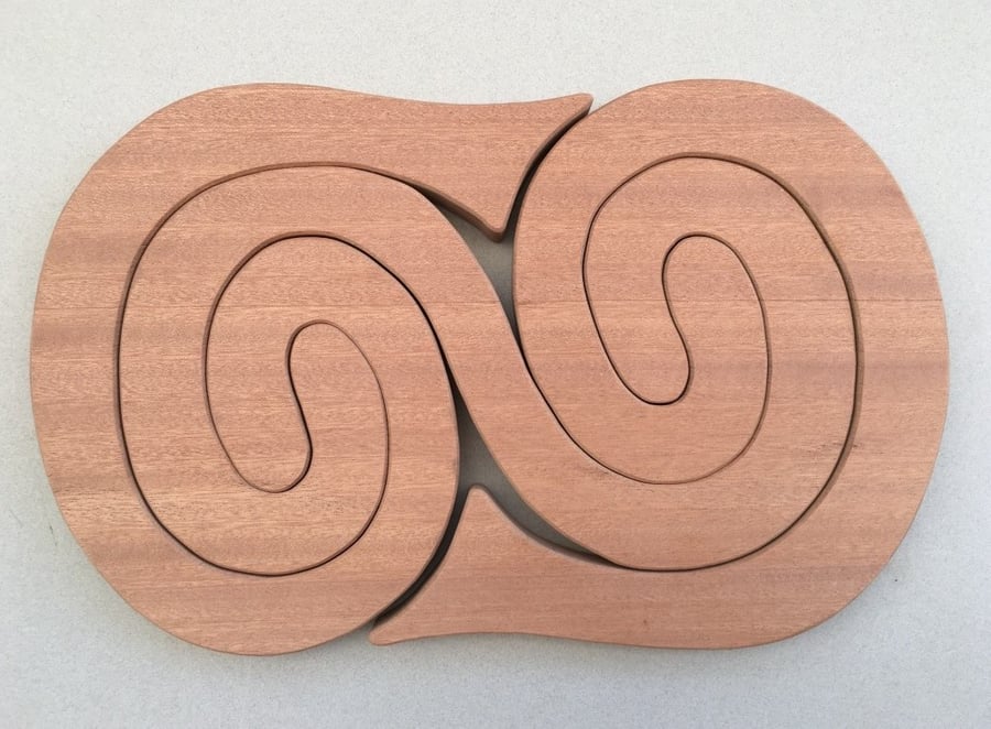 Large Curly Wurly Trivet in either Sapele or Tulipwood