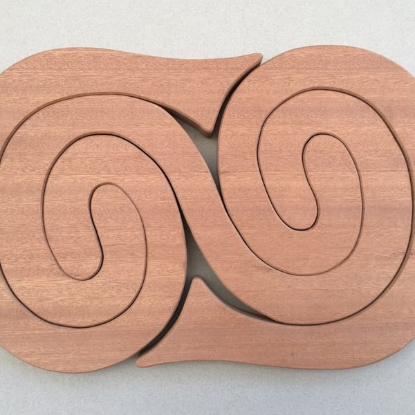 Large Curly Wurly Trivet in either Sapele or Tulipwood
