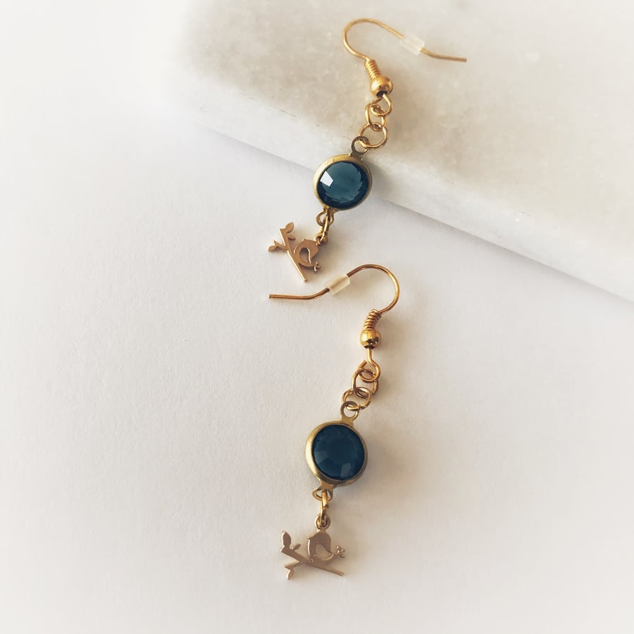  Blue glass gem bird dangle earrings