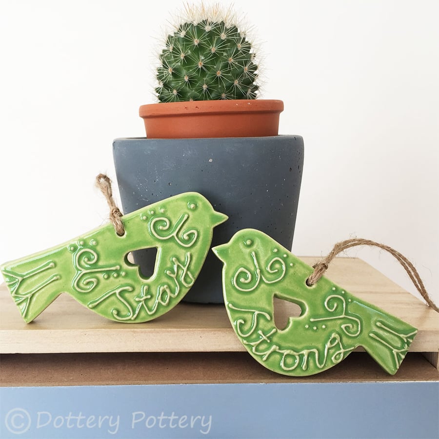 Set of two ceramic lovebird decorations folk art Stay Strong