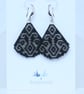 Teardrop Beaded Earrings in Black with Silver Geometric Pattern - Image 6
