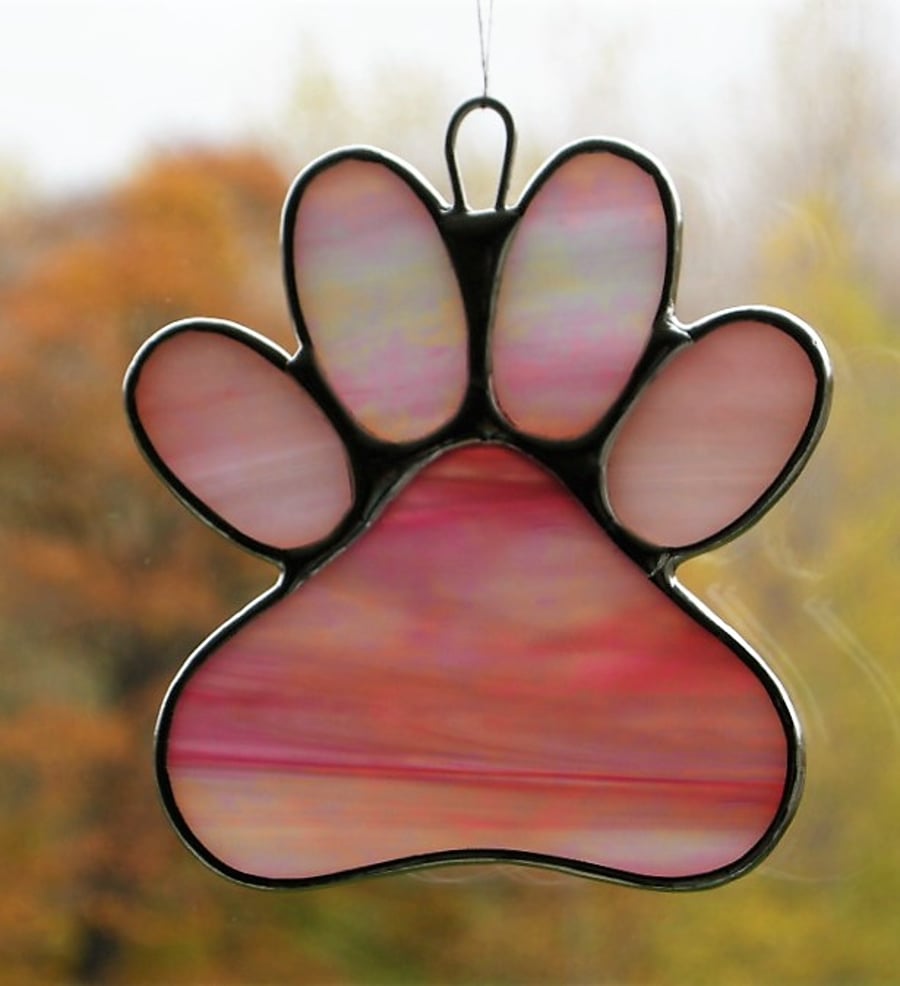 Paw Print in pink and white opalescent iridescent glass