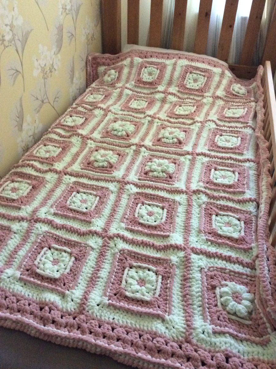 Granny Square chunky crochet blanket in pastel mint and dusty pink colours 