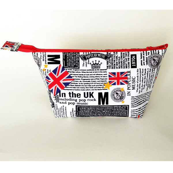Small zipped pouch, newsprint fabric with music news from the 1970’s