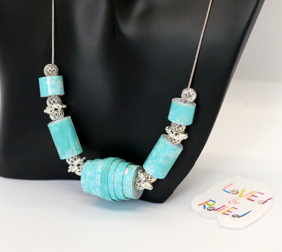 Winter blue and icicles themed necklace on a silver plated chain