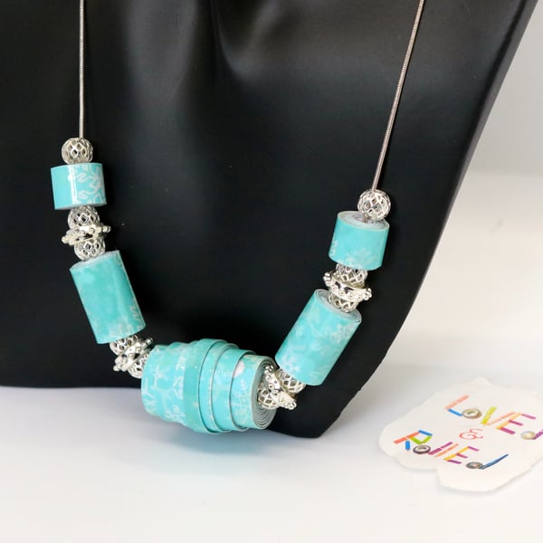 Winter blue and icicles themed necklace on a silver plated chain
