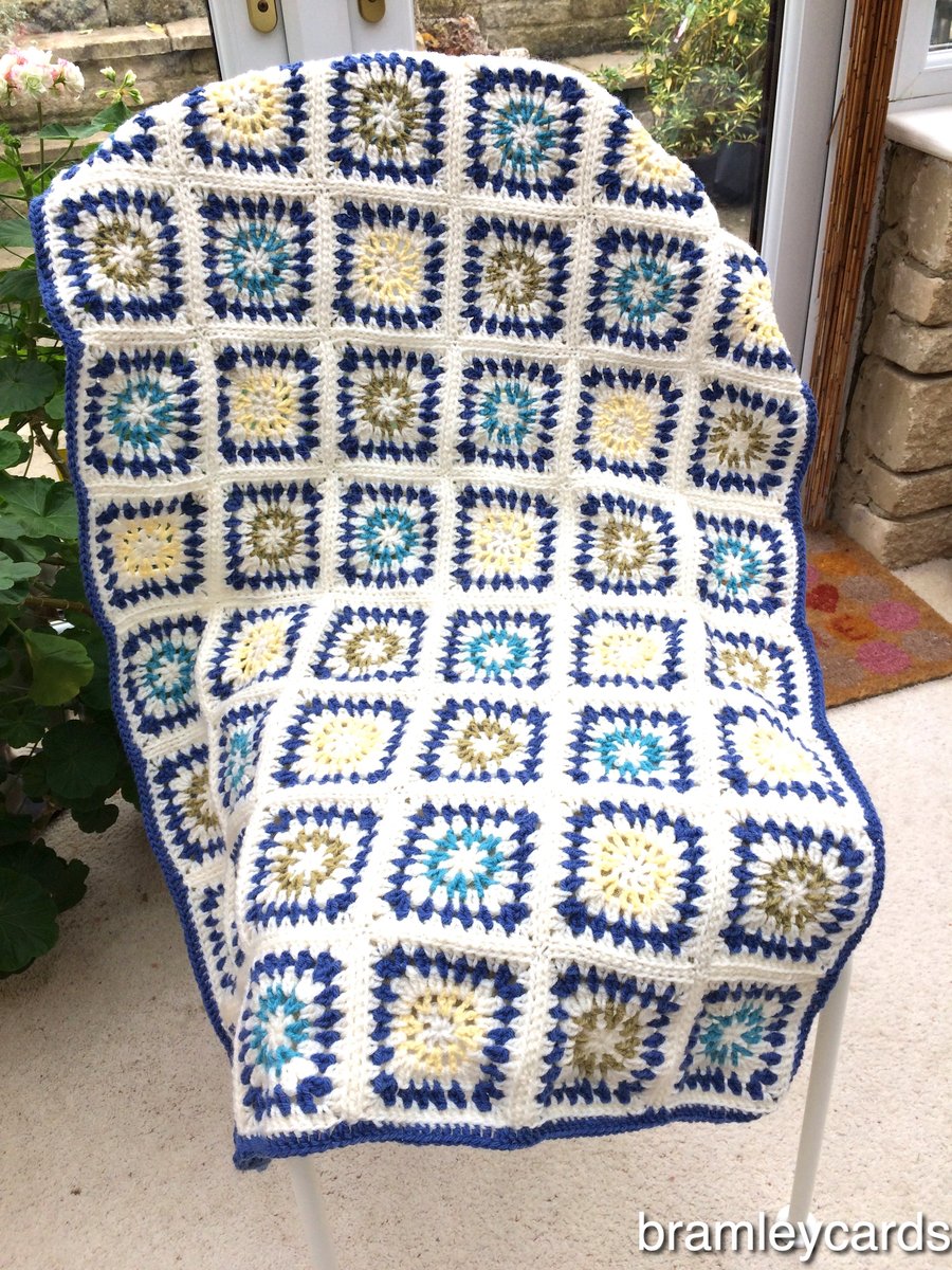 A Blue Star Burst Wool Cot Blanket