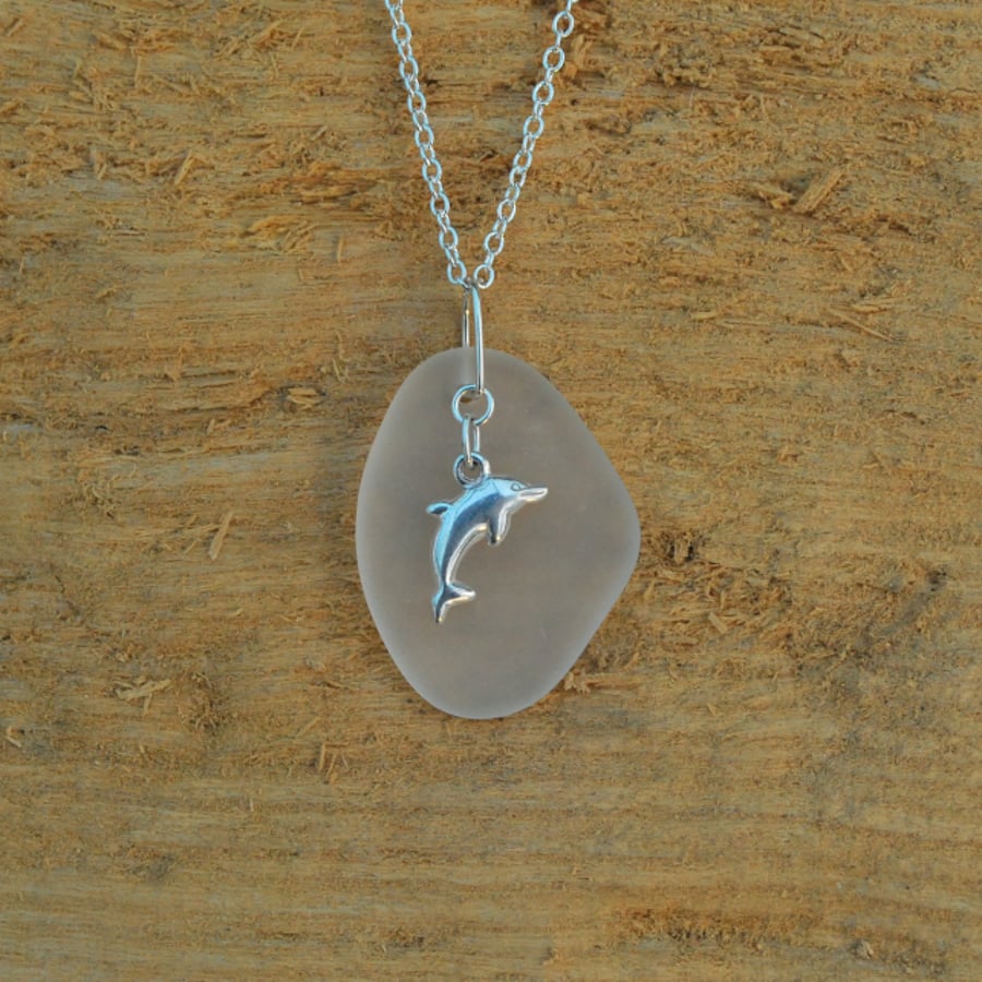 Beach glass pendant with sterling silver dolphin