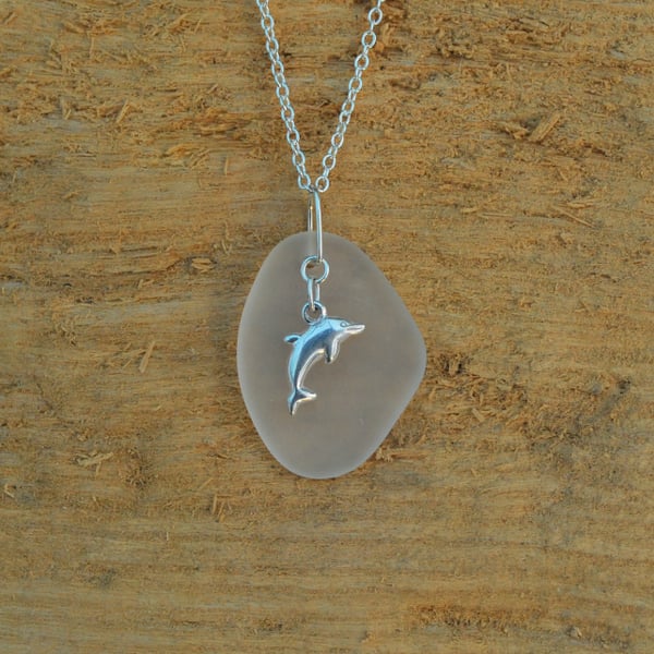 Beach glass pendant with sterling silver dolphin