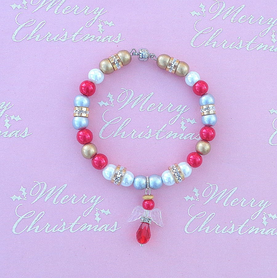 Christmas bracelet. Red, silver, gold beads, magnetic clasp & angel charm
