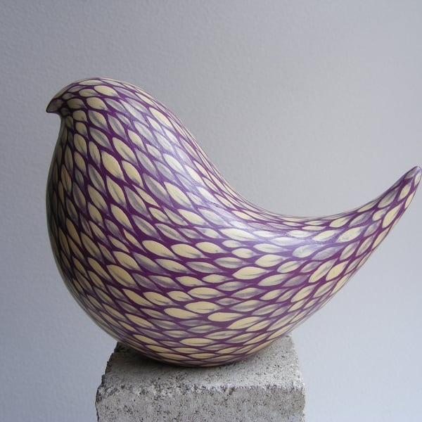 Painted bird (D) cream on blackberry