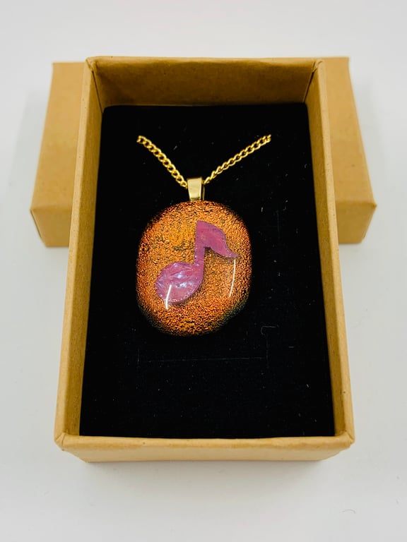 Hand made Dichroic Glass pendant With copper music note inclusion.