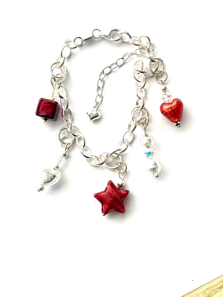 Sterling silver and red Murano glass charm bracelet with Swarovski crystal.