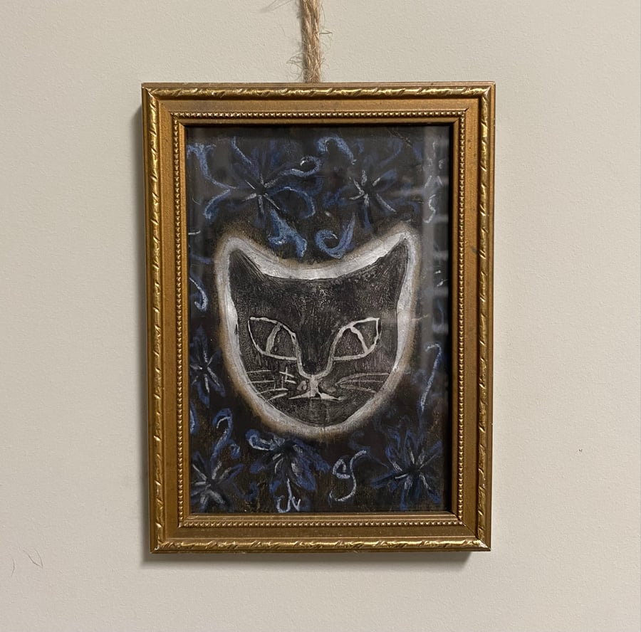 ‘Ghost Cat’ with vintage framing