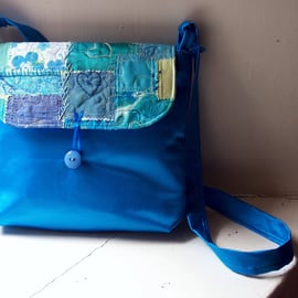 Messenger bag, shoulder bag, turquoise satin with textile art flap 