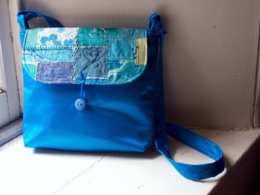 Messenger bag, shoulder bag, turquoise satin with textile art flap 