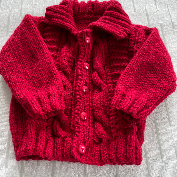 Red cable patterned jacket