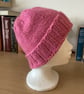 WOMENS HAND KNITTED HAT IN PINK COLOUR YARN APPROX 10" or 25cm LONG