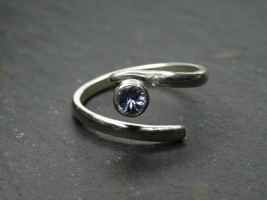 Sterling silver proud isolde ring. twist, adjustable, resizeable. Tanzanite