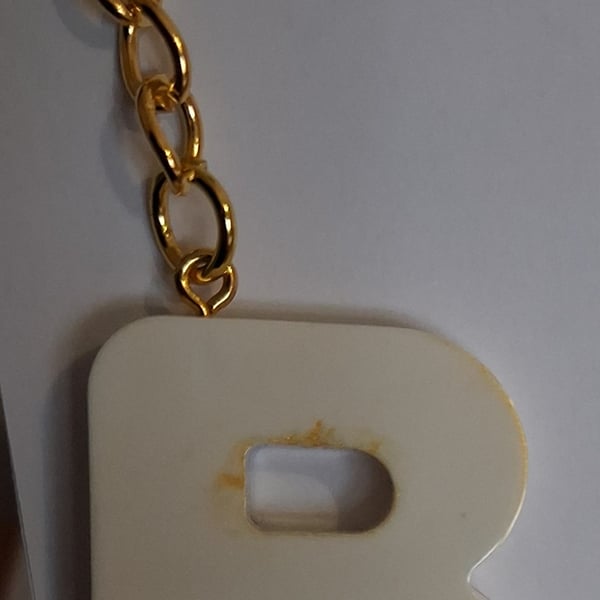 Handmade epoxy resin keyring with initial letter R