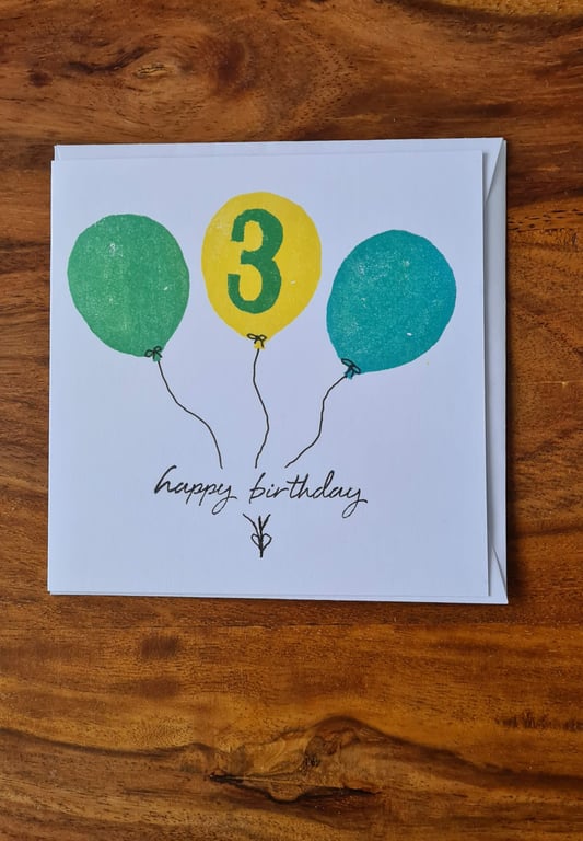 Numbered balloon birthday card handprinted yellow green blue
