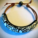 Unique Handcrafted Expandable Bracelet. Made with Leather Braid and Polymer Clay