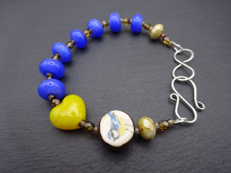lampwork glass bracelet, blue tit ceramic jewellery