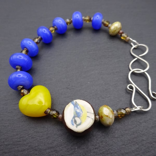 lampwork glass bracelet, blue tit ceramic jewellery