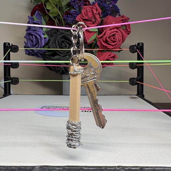 Barbed wire wrapped 2 X 4: Pro Wrestling key chain, Handmade