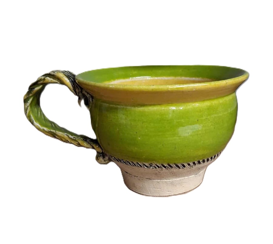 Ceramic wheel thrown Green and Yellow Lipped Round Huggable mug .